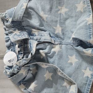 Boutique Denim with stars and Belt size small